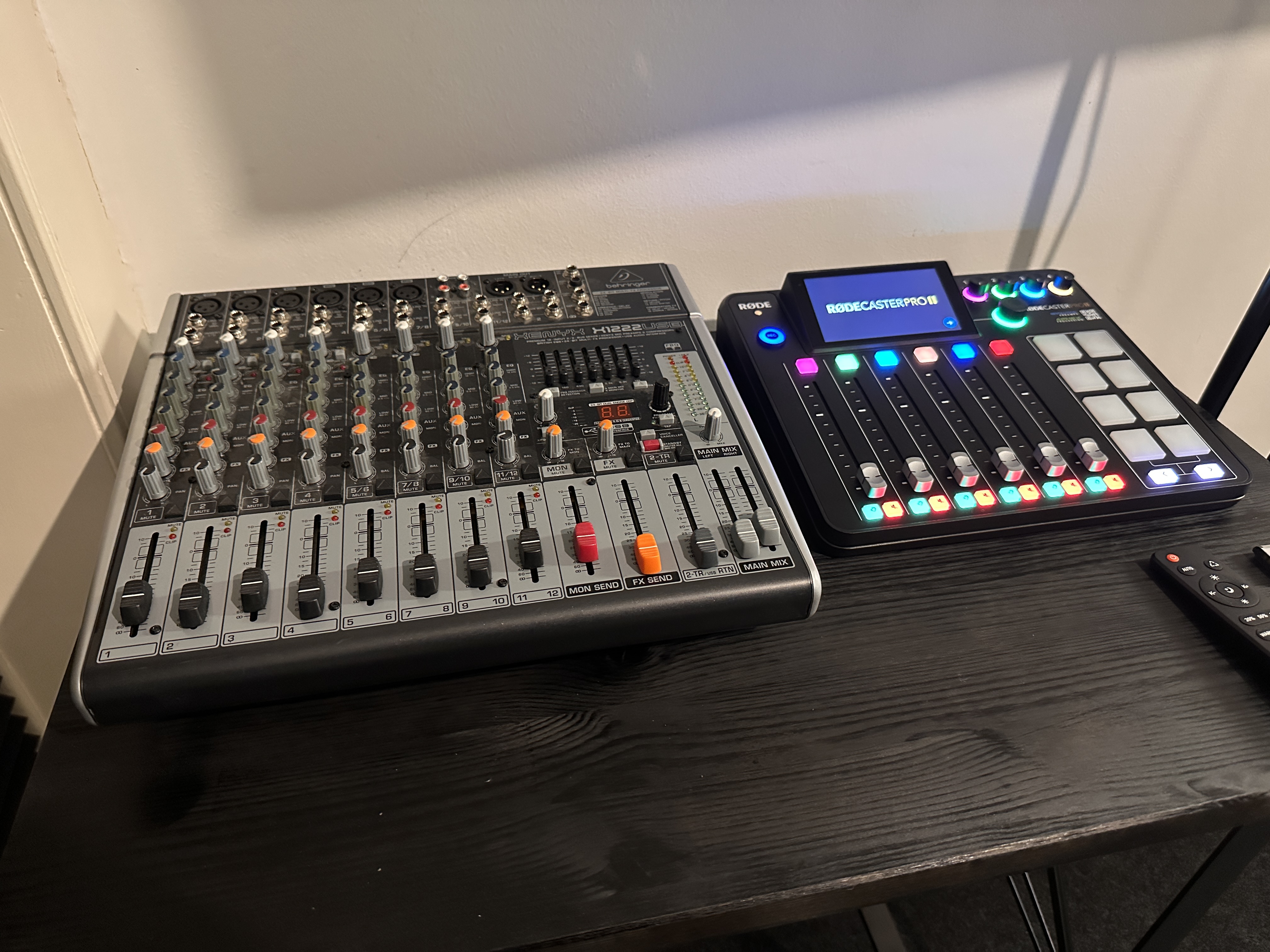 The mixer table at Red Panda Studio: a Behringer Xenyx mixer alongside a RODECaster Pro II